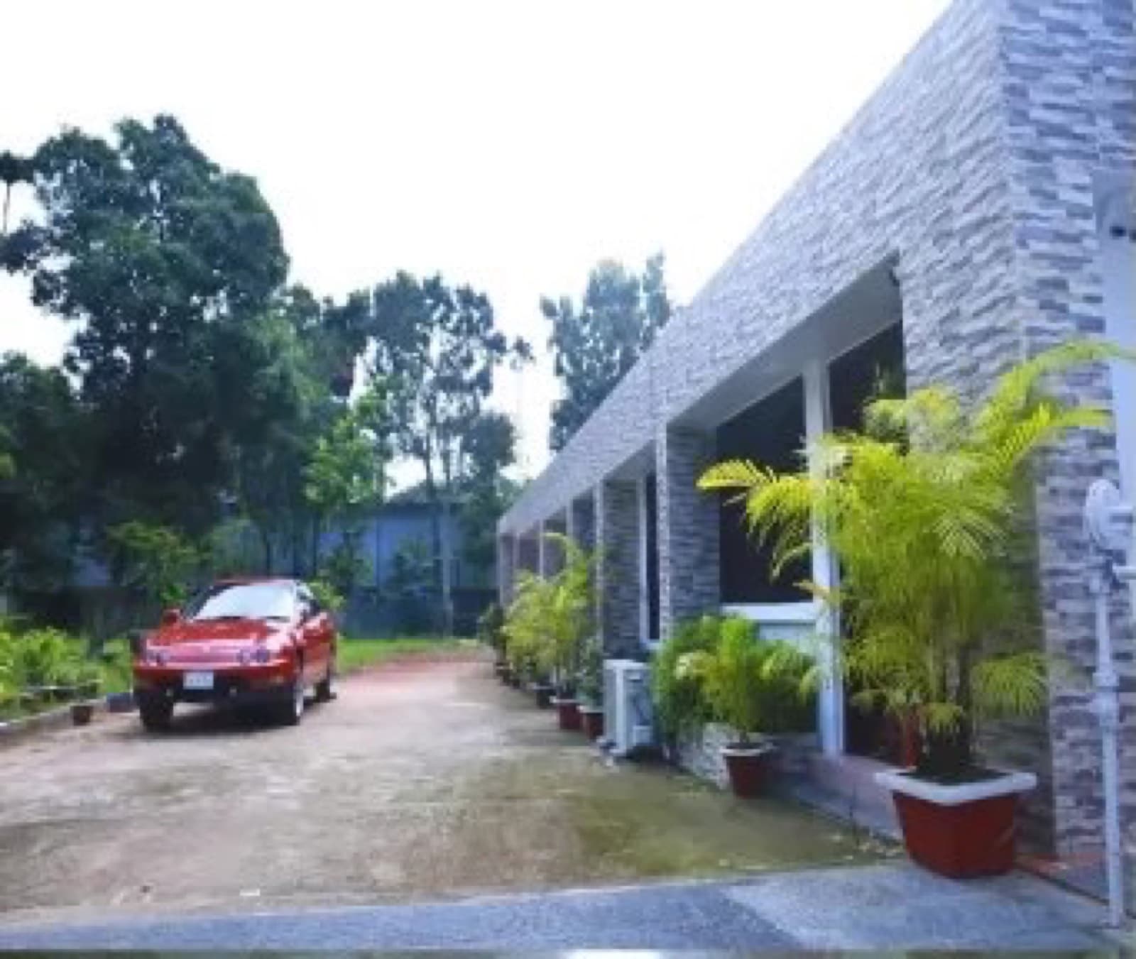 The driveway and entrance of Resort World guest house